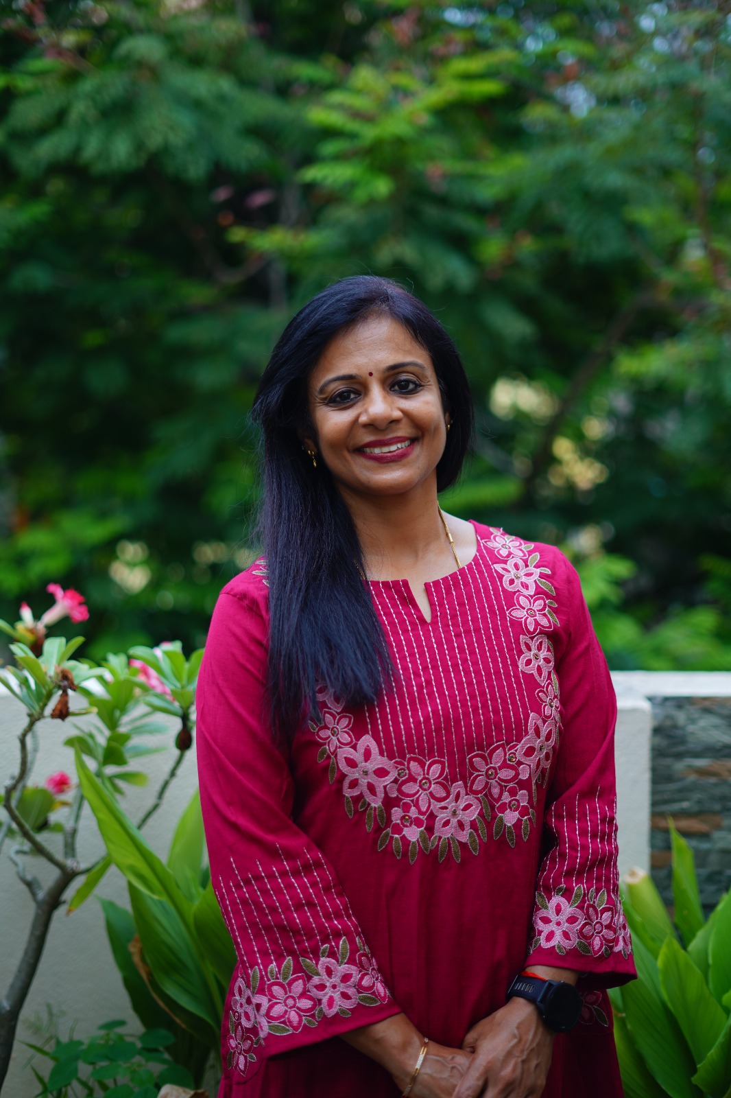 Sushma, Certified Menopause Coaching Specialist and founder of Eat Well Live Well